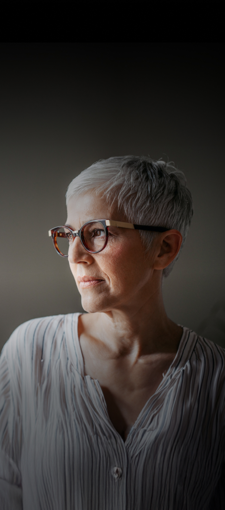middle aged woman with glasses